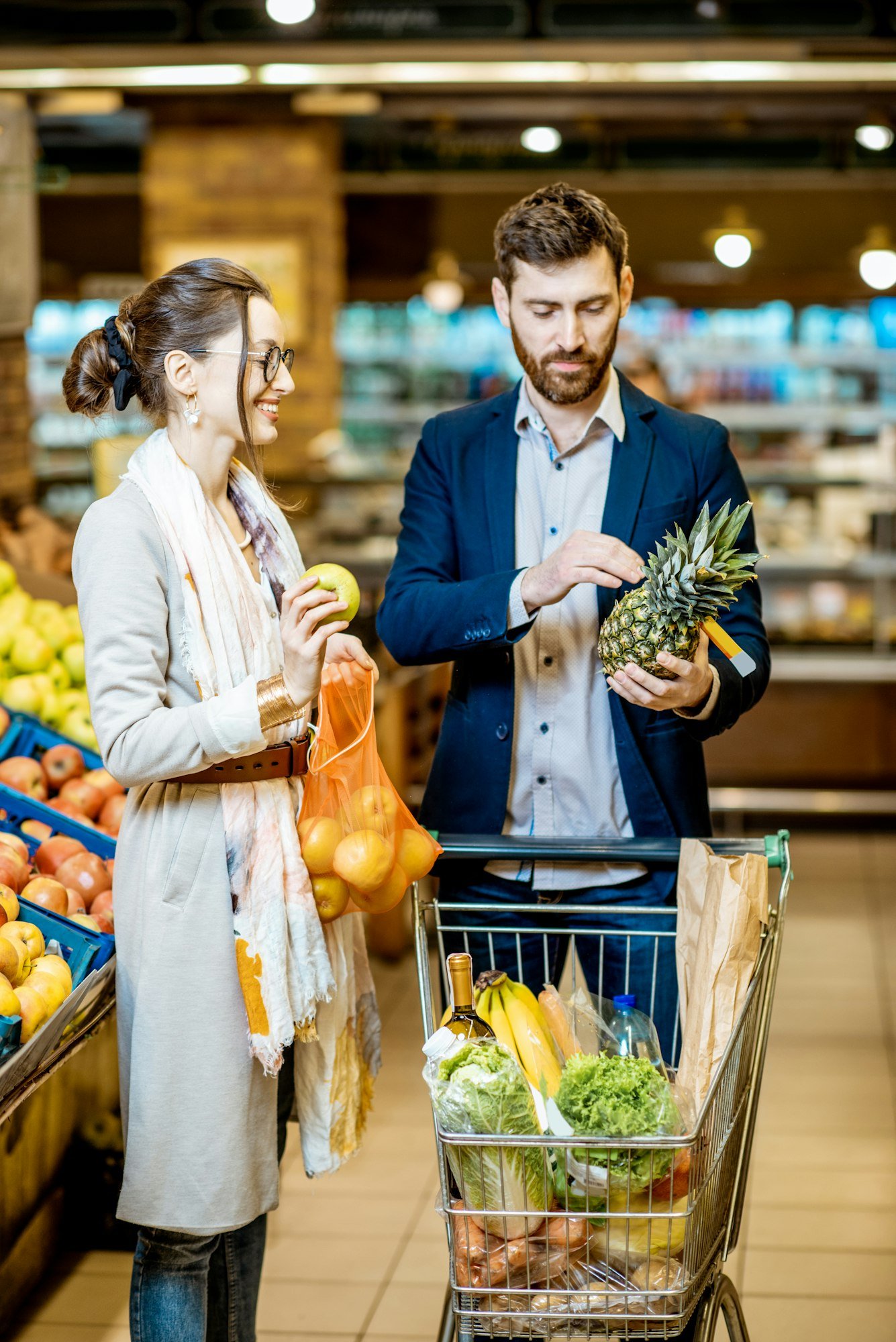 Couple buying fresh food in the supermarket